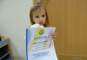 dziecko z dyplomem